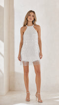 Front view of white halter beaded fringe mini dress