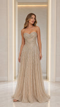 Front view of model wearing Champagne strapless beaded evening gown