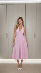 Front view of model wearing pink gingham halter midi dress