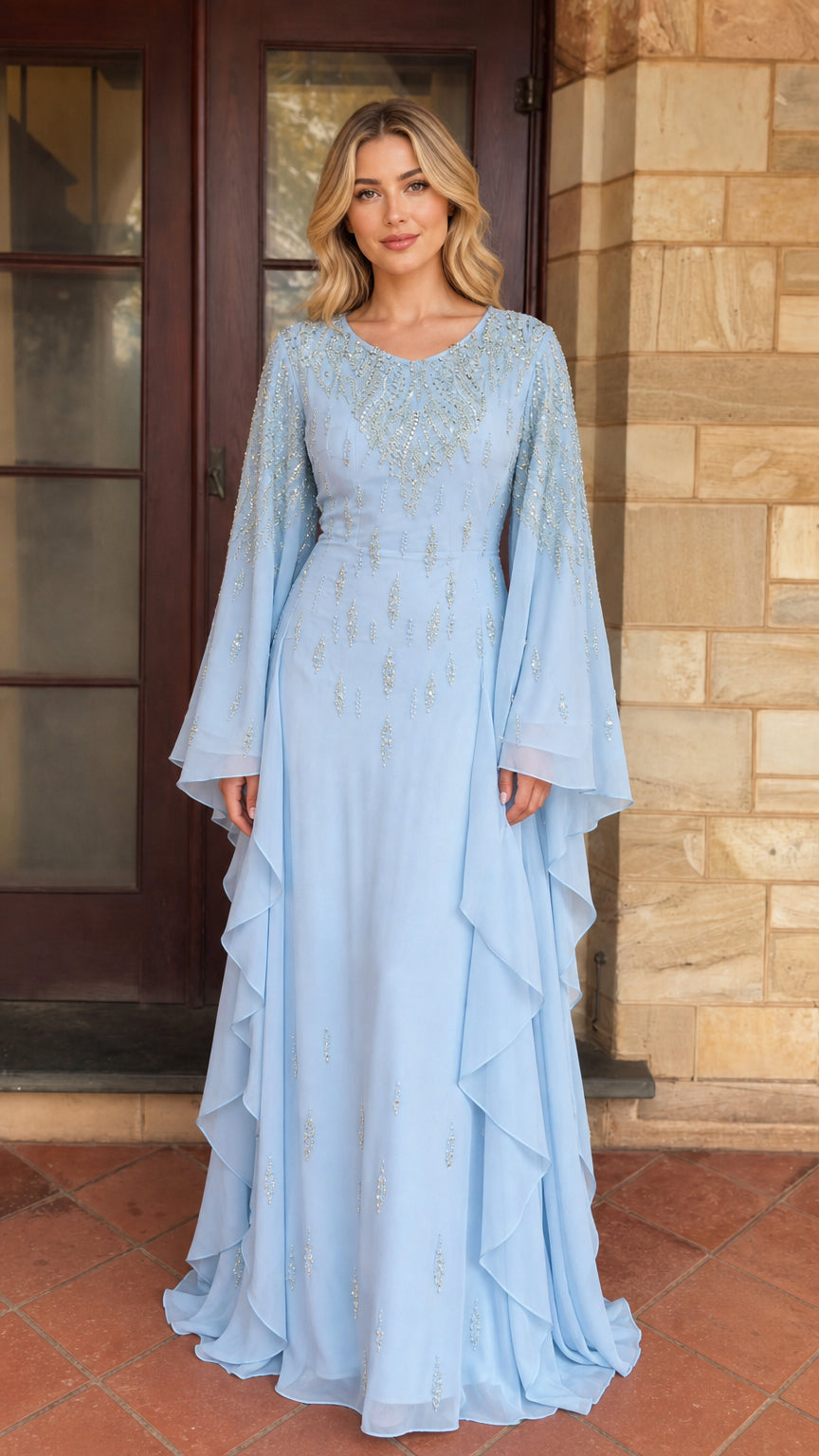 Model wearing light blue beaded long sleeve chiffon maxi dress front view