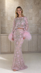 Front view of model wearing pink embellished two-piece feather trim set