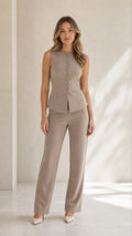 Full front view of taupe vest and pant set