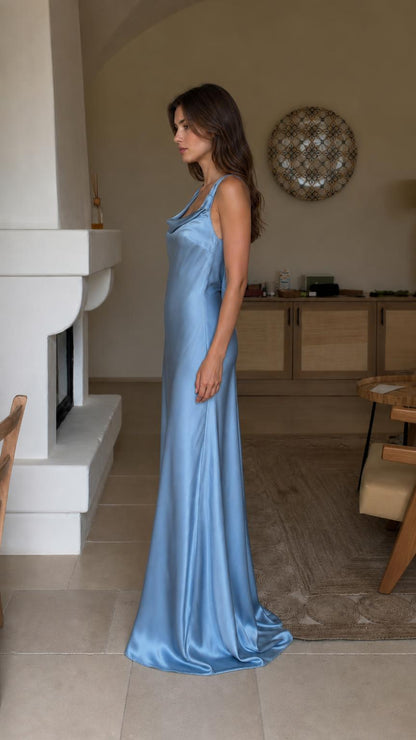 Side profile view of light blue satin maxi dress