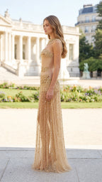 Side profile view of gold beaded evening gown