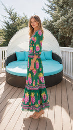 Side profile view of green floral maxi dress