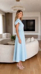 Side profile of light blue midi dress with cap sleeves