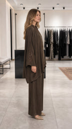 Side view of model wearing brown embroidered lounge set