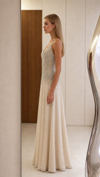 Side profile view of champagne evening gown