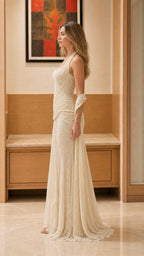 Side profile view of the champagne lace maxi dress