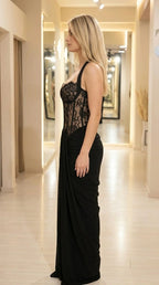 Side profile view of black evening gown