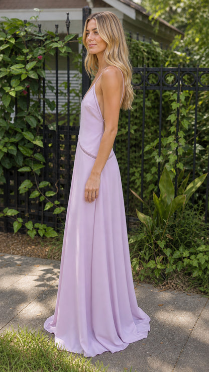 Side profile of model in lavender maxi dress outdoors