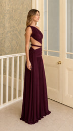 Side profile view of burgundy evening dress