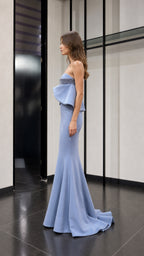 Side profile of light blue evening gown