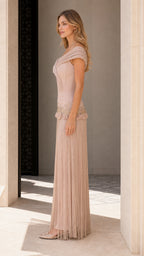 Side profile view of Champagne formal gown
