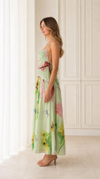 Side profile view of Light Green floral maxi dress