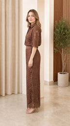 Side profile of model in brown lace matching set