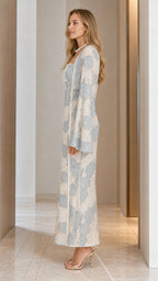Side profile view of champagne floral dress set