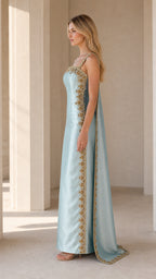 Side profile of Light Blue embellished cape maxi dress