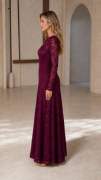 Side profile view of burgundy lace maxi dress