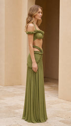 Side view of model in olive green two-piece maxi set