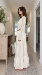 Side profile of model in cream two-piece set