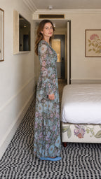 Side profile view of blue floral maxi dress