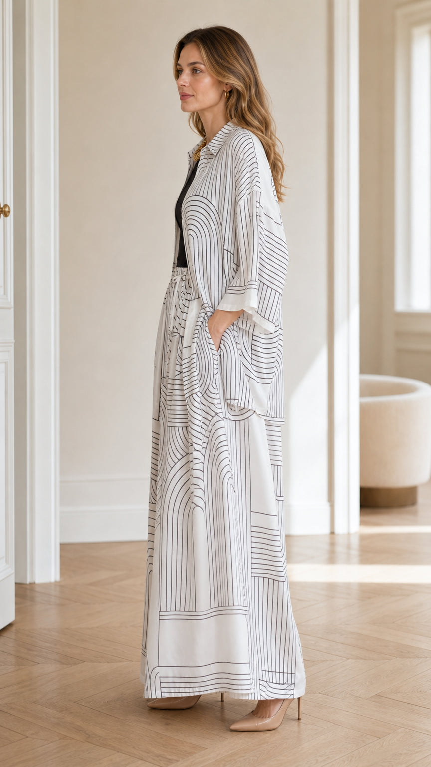 Side profile view of model wearing white coordinate set