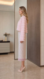 Model wearing pink tweed set side view