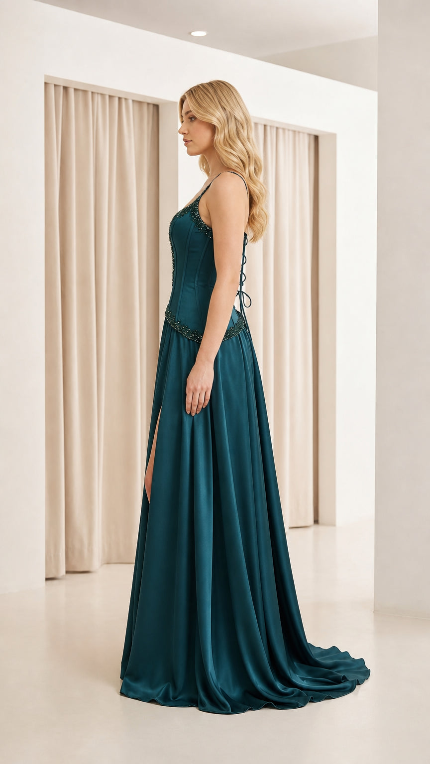 Side profile view of teal corset evening gown