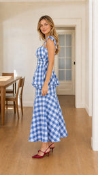 Side profile view of blue gingham dress