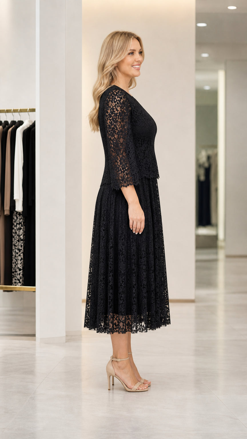 Side view of woman wearing black lace midi dress