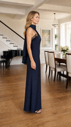 Side profile of model in Navy formal dress showing drape and silhouette