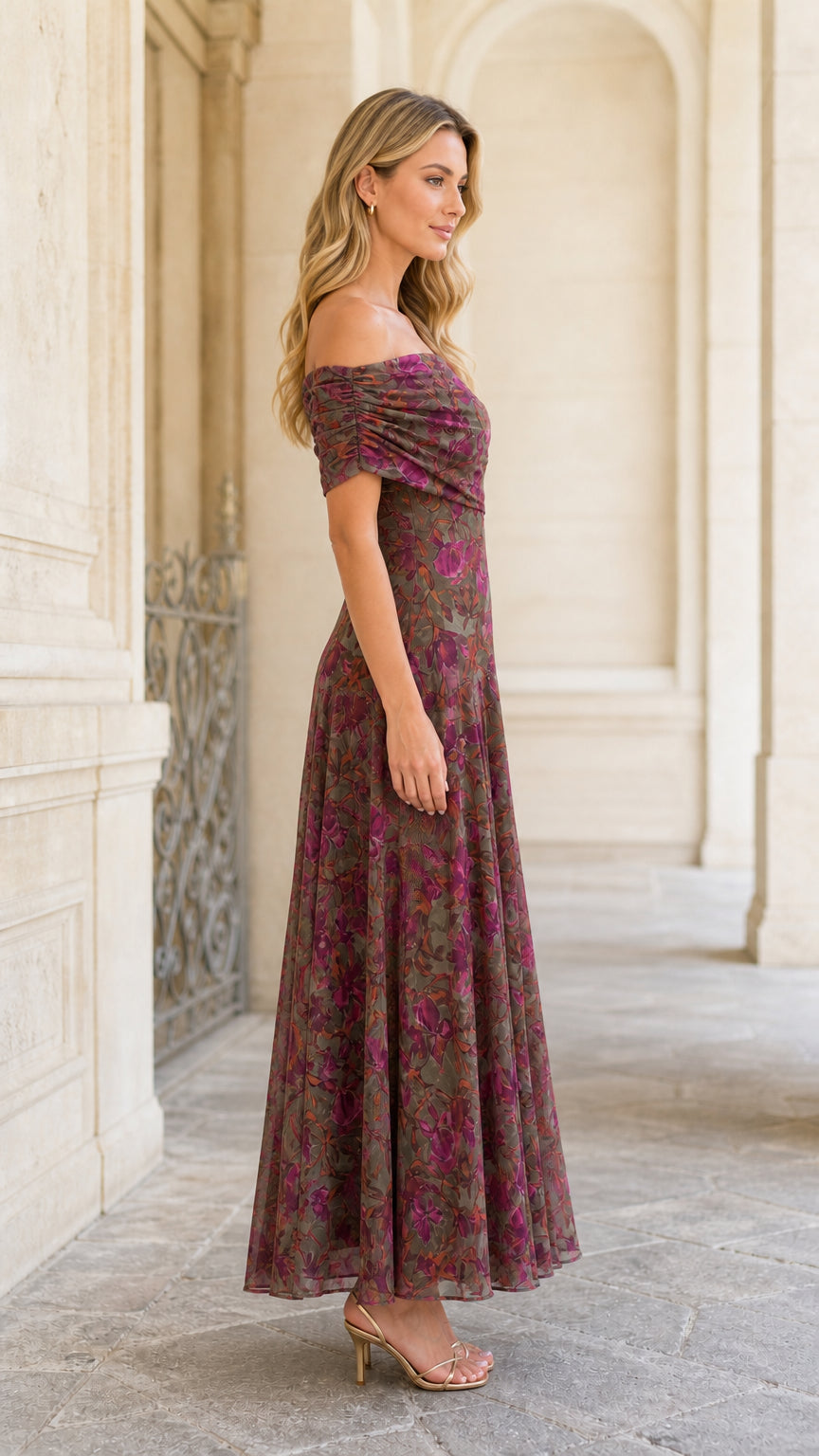 Side profile of model in olive floral maxi dress