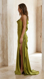 Side profile of olive satin gown showing ruffle back detail