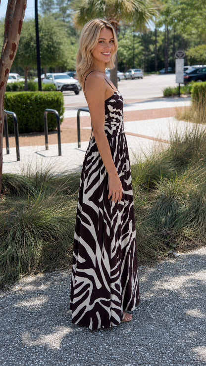 Side profile of black abstract print maxi dress