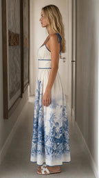 Side profile view of white toile print maxi dress