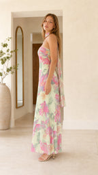 Side profile view of mint green floral maxi dress