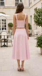 Back view of model wearing pink matching set