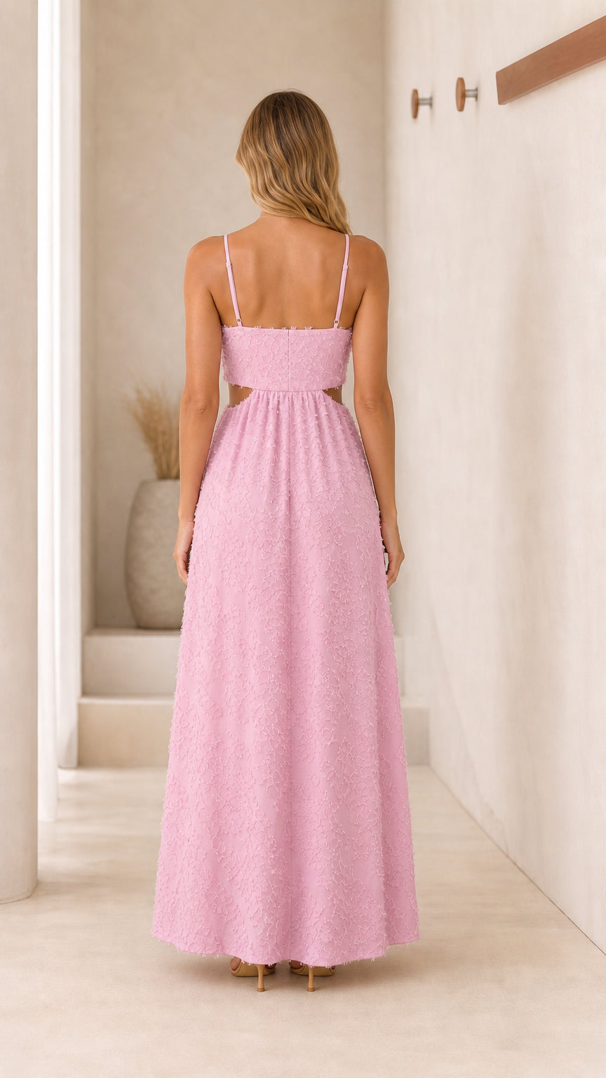 Back view of pink cutout maxi dress