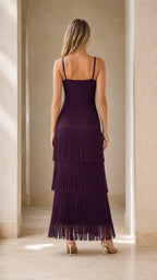 Back view of model showcasing the back straps and fringe tiers