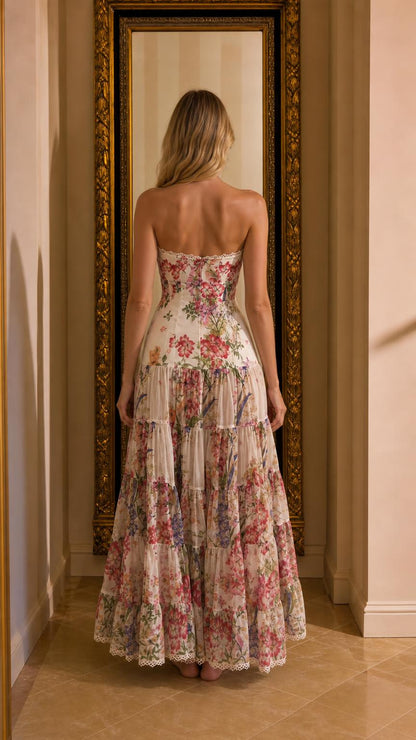 Back view of model in white floral maxi dress