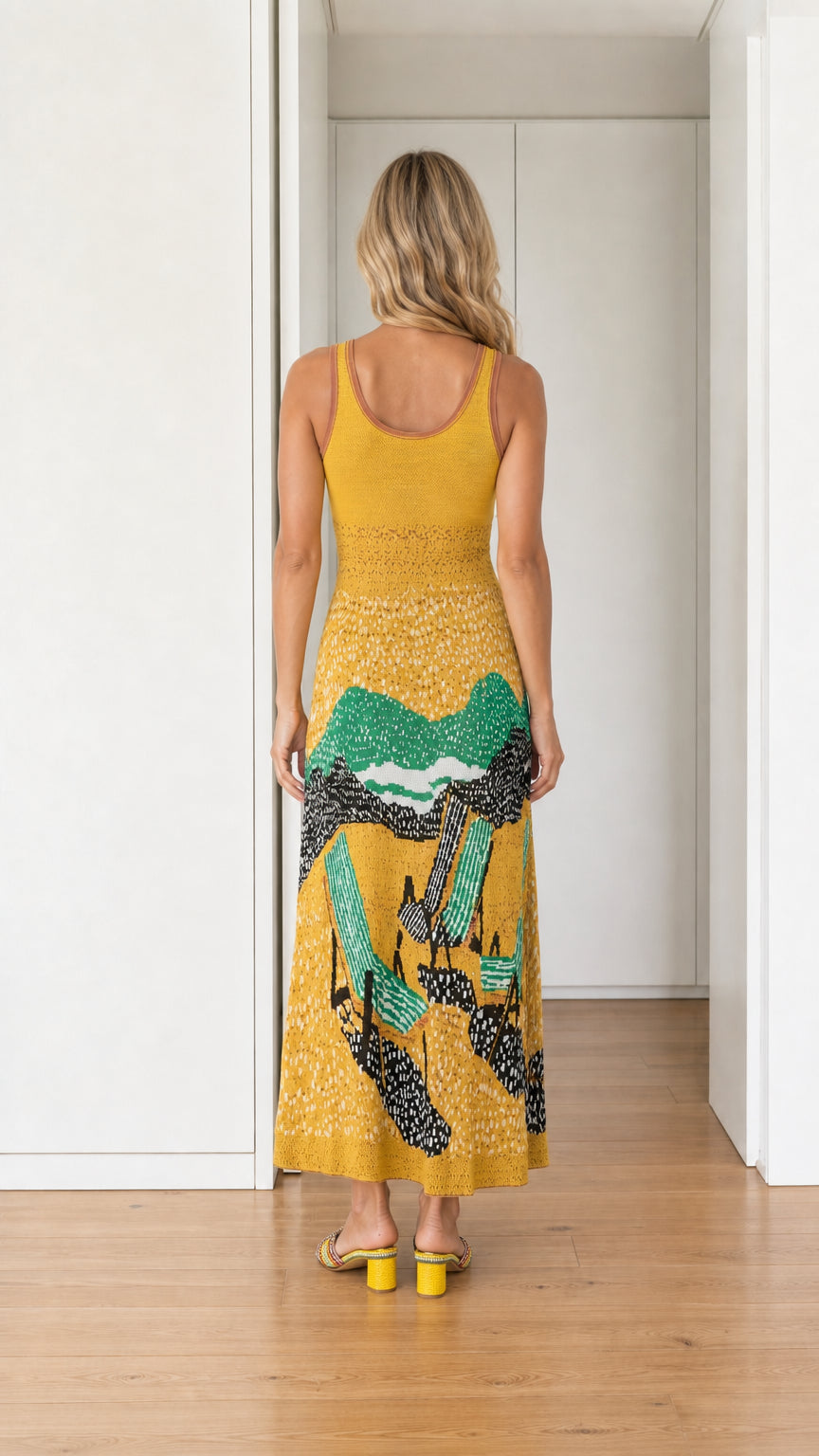 Back view of yellow landscape knit maxi dress