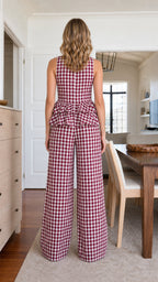 Back view of model in burgundy gingham matching set