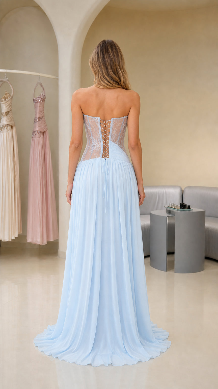 Back view showing corset lacing on light blue gown