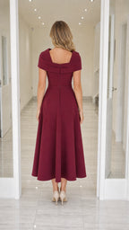 Back view of burgundy midi dress
