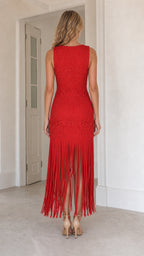 Back view of model in red woven fringe maxi dress