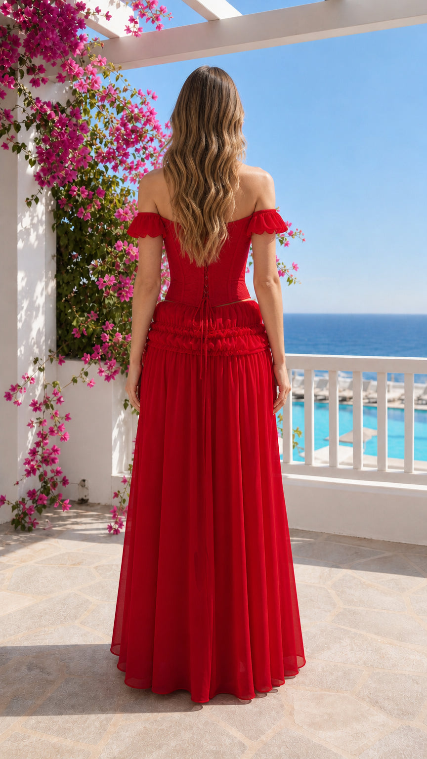 Back view of woman in red off-shoulder maxi dress