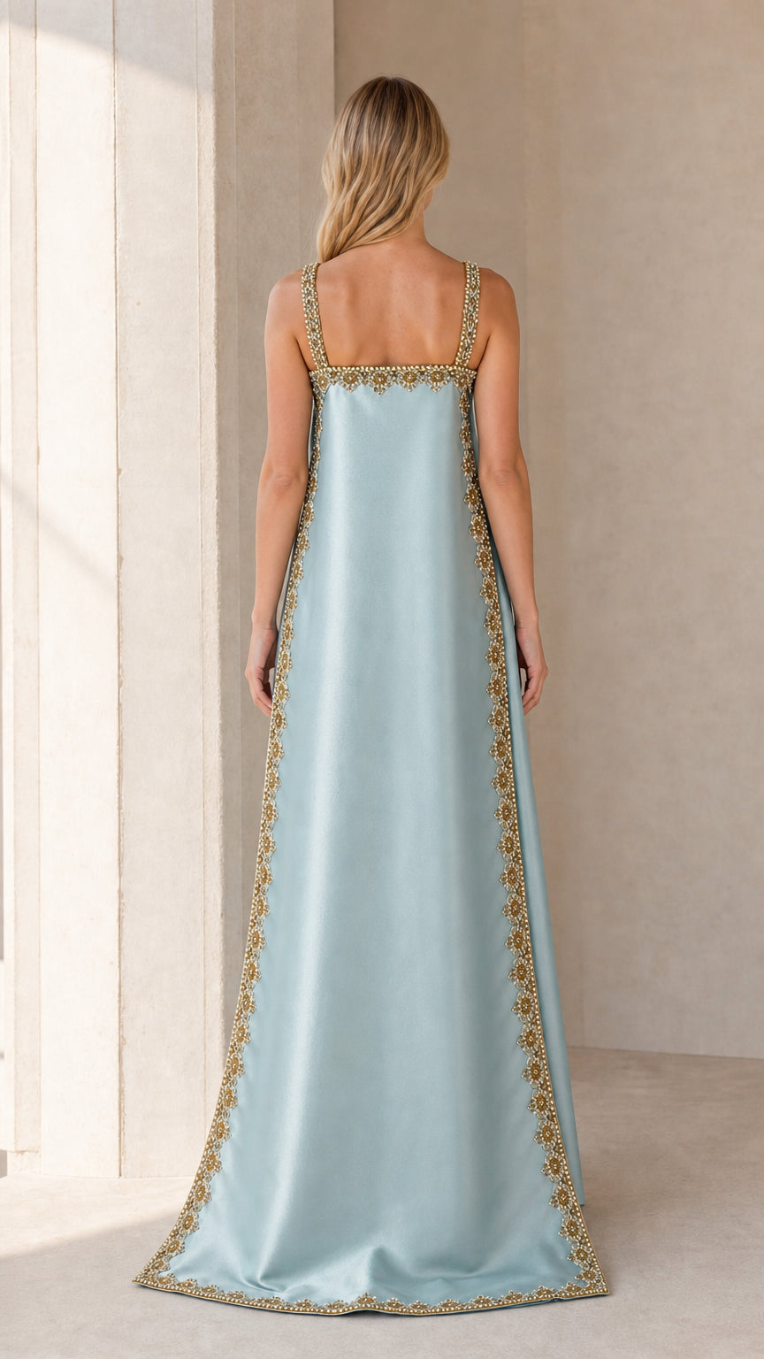 Back view showcasing cape and train of Light Blue gown