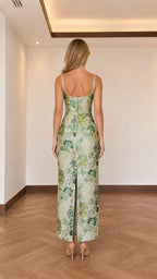 Back view showing back slit detail on sage green maxi dress