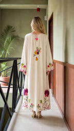 Model wearing Ivory floral embroidered maxi kaftan dress, back view